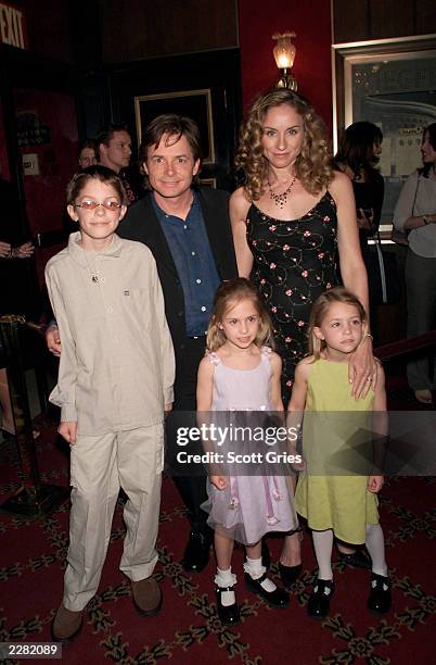 Michael J. Fox arrives with his family, wife Tracy, son Sam, and twin daughters Schuyler and Aquinnah, at the New York premiere of the new Disney...