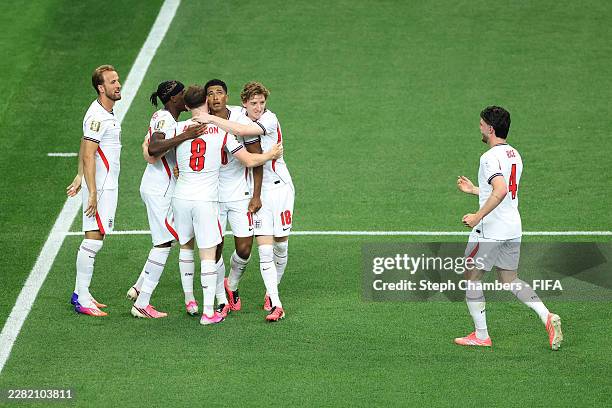 Jude Bellingham of England celebrates with teammates after scoring the team's third goal during the FIFA World Cup 2026 Group L match between England...
