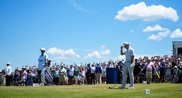 Rory McIlroy of Northern Ireland is introduced to the crowd on the first tee during the final round of 126th U.S. Open Championship at Shinnecock...