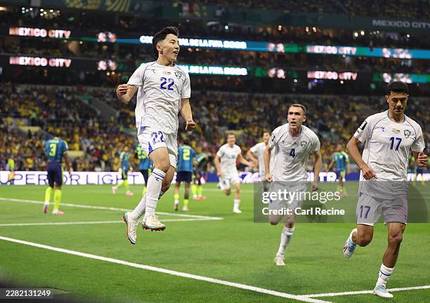 Abbosbek Fayzullaev of Uzbekistan celebrates scoring his team's first goal during the FIFA World Cup 2026 Group K match between Uzbekistan and...