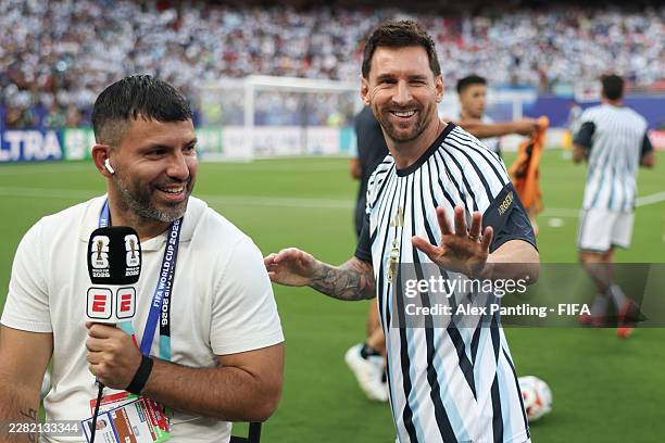 Lionel Messi of Argentina greets pundit and former team mate Sergio Aguero during the FIFA World Cup 2026 Group J match between Argentina and Algeria...