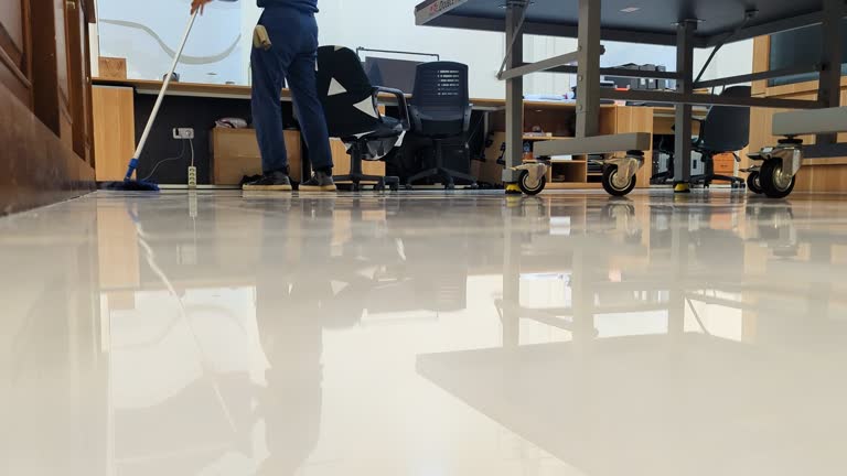 https://media.gettyimages.com/id/2282136344/video/a-janitor-sweeps-the-office-floor-keeping-the-workspace-clean-and-tidy-as-the-polished.jpg?b=1&s=640x640&k=20&c=eSnREmGyxK1ZsqkhYM3BNxAVXWXxgTp_IlFkpQLU7YE=