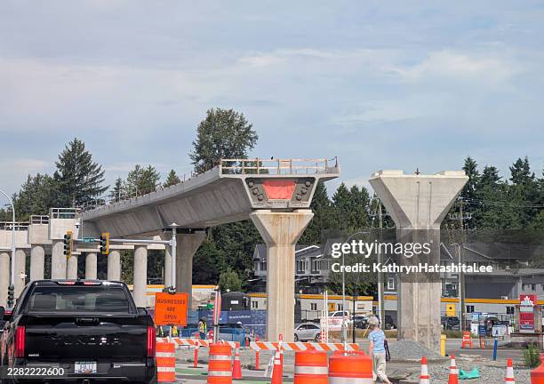 constructing the vancouver skytrain extension, surrey, canada - vancouver skytrain stock pictures, royalty-free photos & images