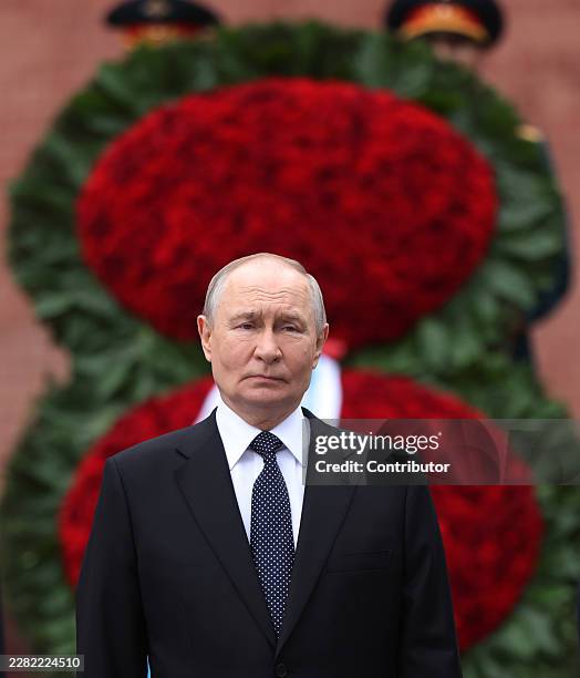 Russian President Vladimir Putin arrives to lay a wreath during a ceremony at the Unknown Tomb on June 22, 2026 in Moscow, Russia. Putin is marking...