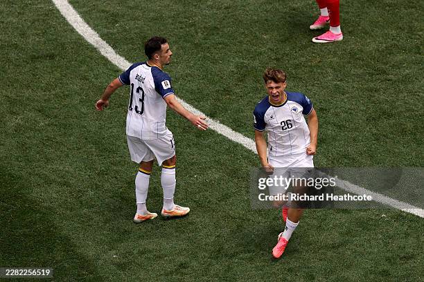 Ermin Mahmic of Bosnia and Herzegovina celebrates scoring his team's first goal during the FIFA World Cup 2026 Group B match between Switzerland and...