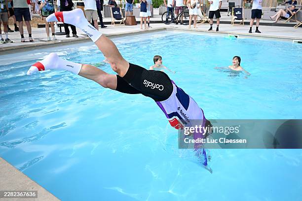 Alex Aranburu of Spain and Team Cofidis - Purple Leader Jersey winner, jumps into the pool after the 95th Baloise Belgium Tour 2026, Stage 3 a 173km...