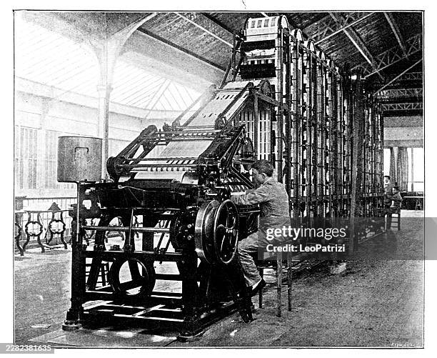 industrial machinery for gumming and drying paper being operated by a worker inside a factory workshop - rolling paper stock illustrations