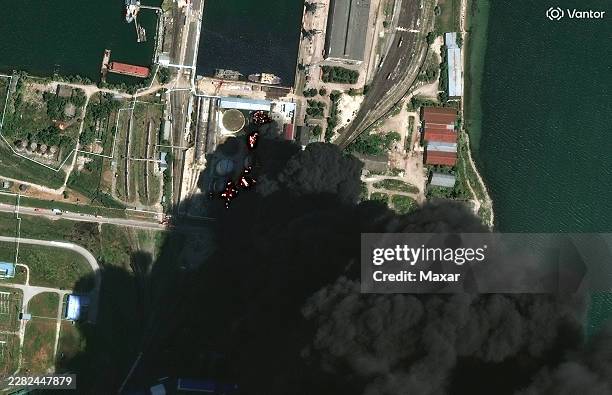 Vantor satellite image shows burning storage tanks and heavy smoke following attacks in Kerch. Please use: Satellite image 2026 Vantor.
