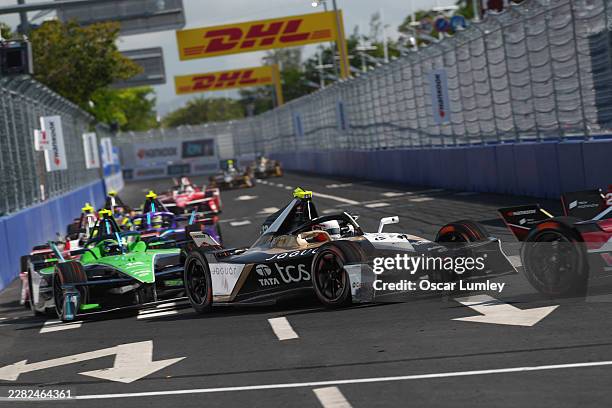Antonio Felix da Costa of Portugal driving the Jaguar TCS Racing Jaguar I-TYPE 7 leads Joel Eriksson of Sweden driving the Envision Racing Jaguar...