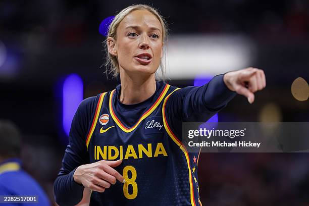 Sophie Cunningham of the Indiana Fever points during the game against the Phoenix Mercury at Gainbridge Fieldhouse on June 22, 2026 in Indianapolis,...