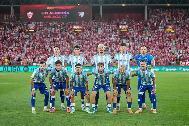 Players of Malaga CF pose for photo during the Liga Hypermotion, second leg of the Playoff for LaLiga EA Sports promotion, football match played...