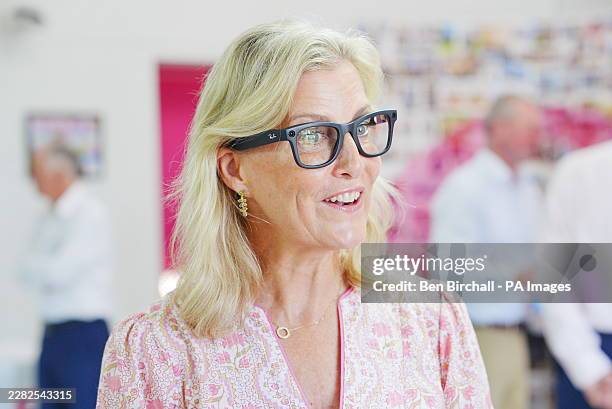 The Duchess of Edinburgh trying on Ray-Ban Meta glasses during a visit to EYECAN, a Jersey charity focused on supporting Islanders with sight...