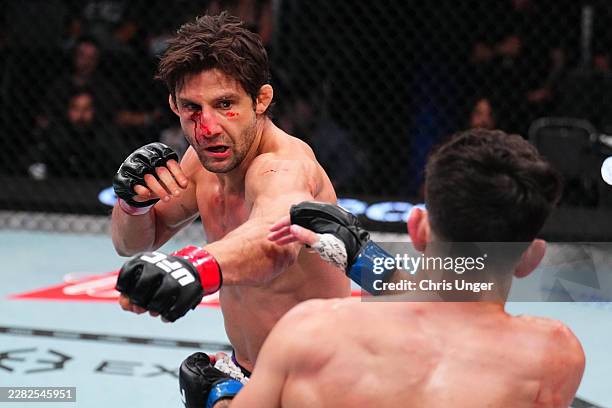 Allan Nascimento of Brazil punchesMitch Raposo in a flyweight fight during the UFC Fight Night event at Meta APEX on June 20, 2026 in Las Vegas,...