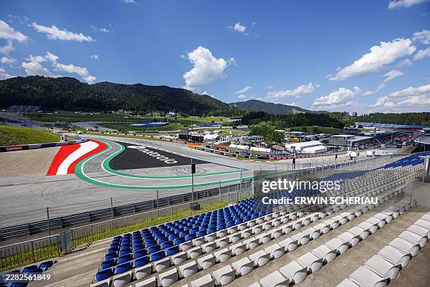 General view shows the starting curve during preparations and contruction work at the Red Bull Ring race track in Spielberg, Austria on June 24 ahead...