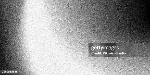 abstract spotlit grainy grey background, abstract grainy black and white gradient background with curved light beam - soft focus stock illustrations