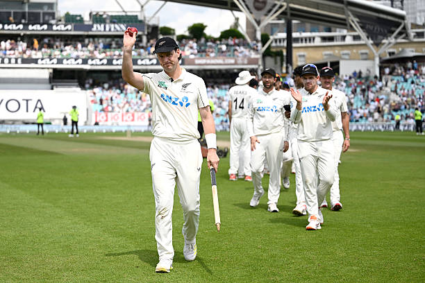 Matt Henry of New Zealand holds up the ball as his leaves the field after winning the 2nd Rothesay Test Match between England and New Zealand at The...