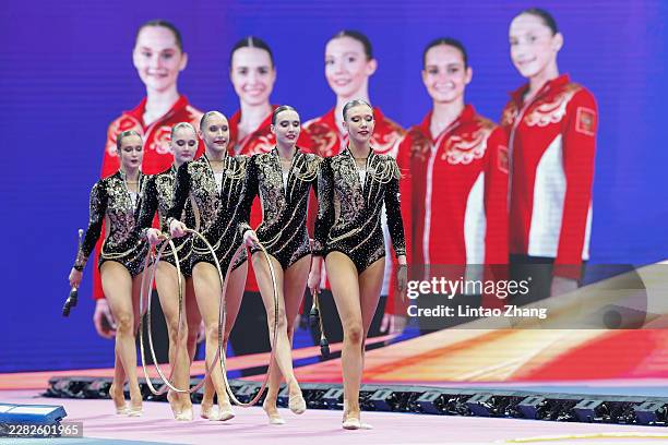 Team of Russia competes in the Group 3 Hoops & 2 Clubs Apparatus Final on day three of the FIG World Challenge Cup at Beijing Indoor Stadium on June...