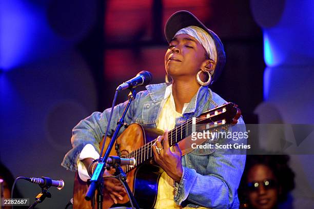 Lauryn Hill sheds a tear while performing on 'MTV Unplugged' at the MTV Studios in New York City, 7/21/01. Photo by Scott Gries/ImageDirect.
