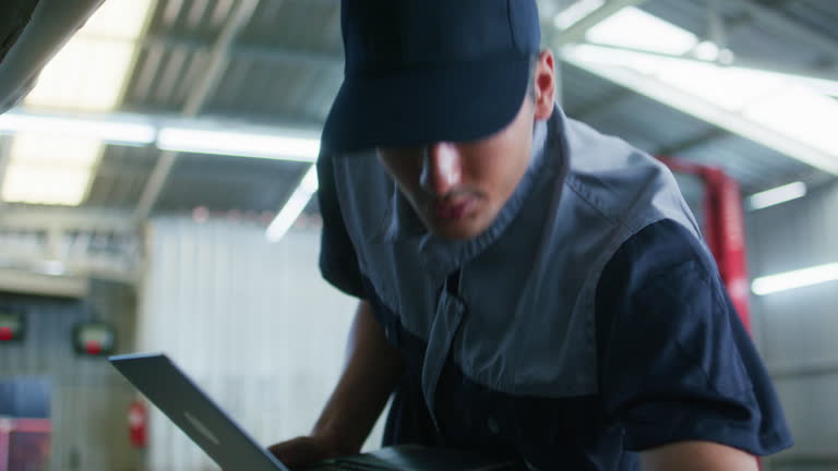https://media.gettyimages.com/id/2282687444/video/car-service-technician-using-laptop-for-general-vehicle-inspection-in-a-modern-auto-workshop.jpg?b=1&s=640x640&k=20&c=qiZ9n9SEP89e7lPPMRHa4joKwmATSjvs7Zwx4qIf9Kk=