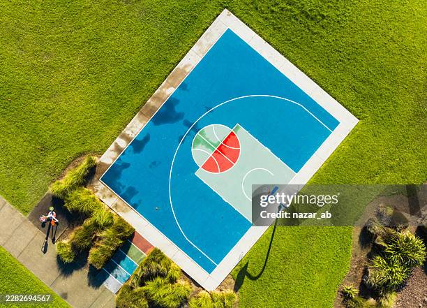outdoor court revealing its true geometric beauty. - recreational equipment stock pictures, royalty-free photos & images