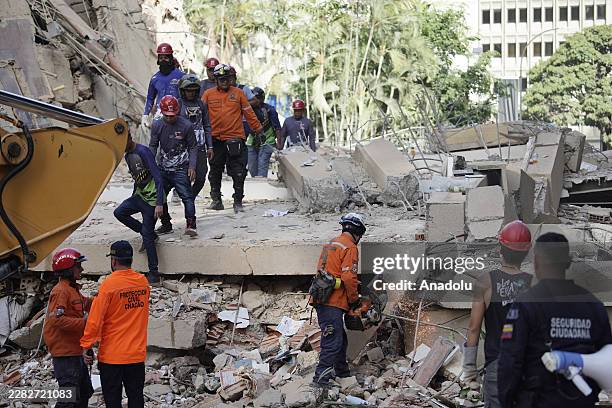 Search and rescue team work on a collapsed building after an earthquake in Caracas, Venezuela, on June 25, 2026.