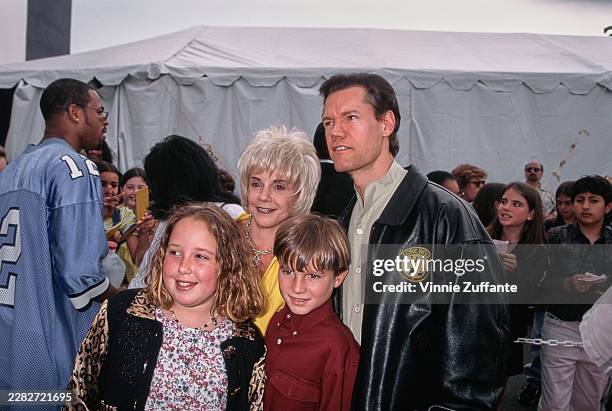 American singer-songwriter Randy Travis with his wife, Mary Elizabeth 'Lib' Hatcher, at the 10th Annual Nickelodeon Kids' Choice Awards at the...