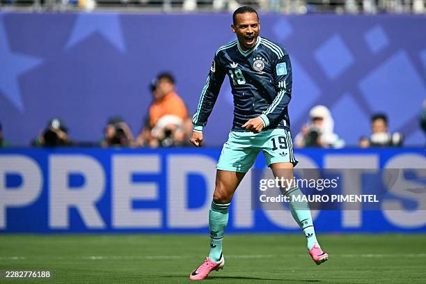 Germany's forward Leroy Sane celebrates scoring his team's first goal during the 2026 World Cup Group E football match between Ecuador and Germany at...