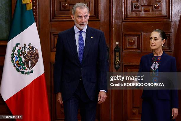 Mexicos' President Claudia Sheinbaum lets King Felipe VI of Spain go first during a meeting at the Palacio Nacional in Mexico City on June 25, 2026.