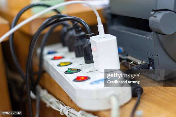 plug the power plug, multiple socket with connected plugs. - socket set stock pictures, royalty-free photos & images