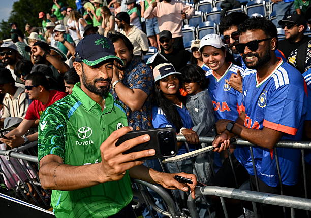 Northern Ireland , United Kingdom - 26 June 2026; Ireland's Jai Moondra takes a selfie with supporters after match one of the Spinny Cup Men's T20...