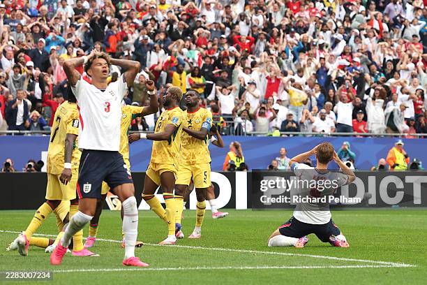 Nico O'Reilly and Harry Kane of England react after a missed chance during the FIFA World Cup 2026 Group L match between England and Ghana at Boston...