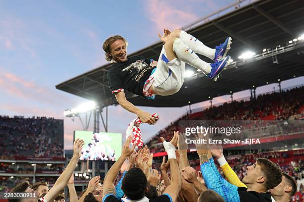 Luka Modric of Croatia celebrates with teammates after earning his 200th cap during the FIFA World Cup 2026 Group L match between Panama and Croatia...