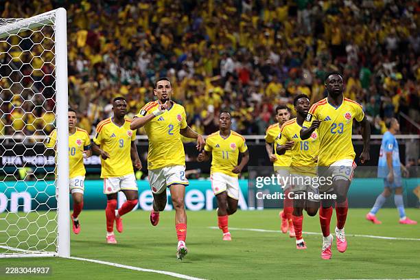 Daniel Munoz of Colombia celebrates with teammates after scoring the team's first goal during the FIFA World Cup 2026 Group K match between Colombia...