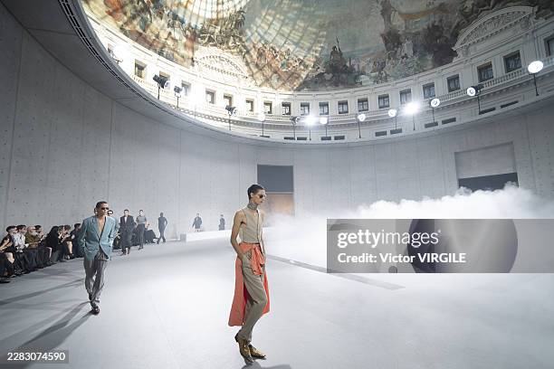 Model walks the runway during the Saint Laurent Menswear Spring/Summer 2027 fashion show as part of Paris Fashion Week on June 23, 2026 in Paris,...