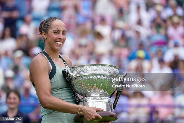 Madison Keys of the United States receives the winner's trophy during the presentation ceremony at the conclusion of the 2026 Lexus Eastbourne Open...