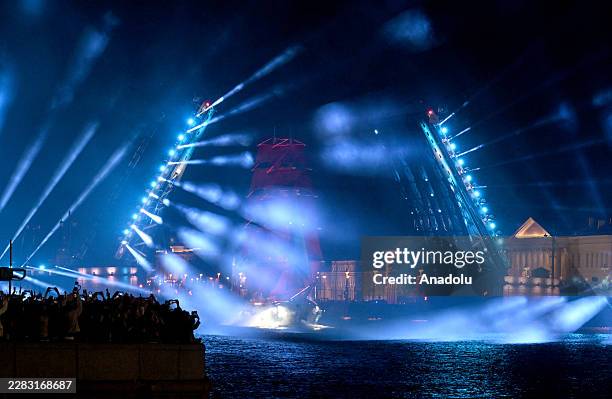 Frigate 'Rossiya' with scarlet sails floats on the Neva River in central Saint Petersburg early on June 28 during the 'Scarlet Sails', a festival...