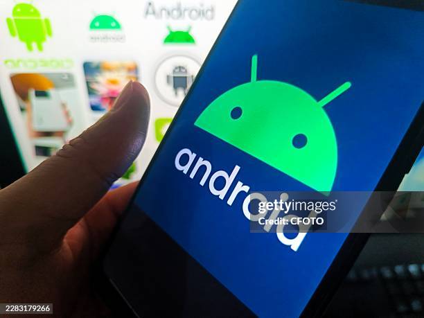 Netizen is using his mobilephone to view Android logo and using his computer to view Android webpage in Suqian, Jiangsu, China on June 28, 2026.