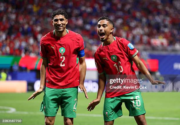 Gessime Yassine of Morocco celebrates with teammate Achraf Hakimi after scoring his team's fourth goal during the FIFA World Cup 2026 Group C match...