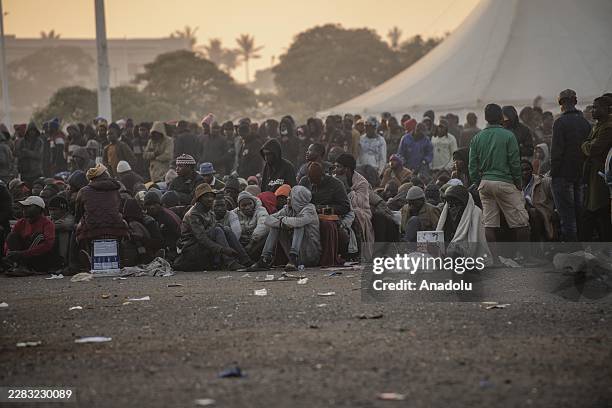 Malawian migrants wait to be registered by South African immigration officials to return to their home country, amid ongoing anti-foreigner protests...