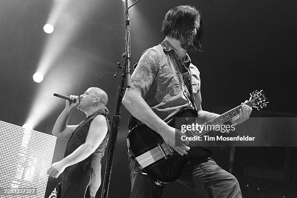 Dave Draiman and Dan Donegan of Disturbed perform during the Music as a Weapon Tour at Power Balance Pavilion on March 13, 2011 in Sacramento,...