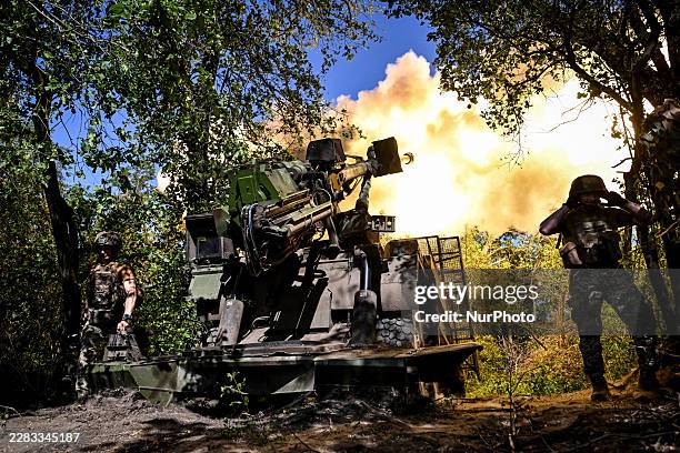Soldiers from the 148th Separate Artillery Zhytomyr Brigade of the Ukrainian Armed Forces fire a CAESAR self-propelled howitzer in the Oleksandrivka...