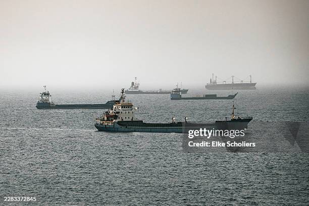 Crude oil tankers, bulk carriers and vessels sit anchored around Qaboos Port on June 22, 2026 in Muscat, Oman. The Strait of Hormuz, a vital shipping...