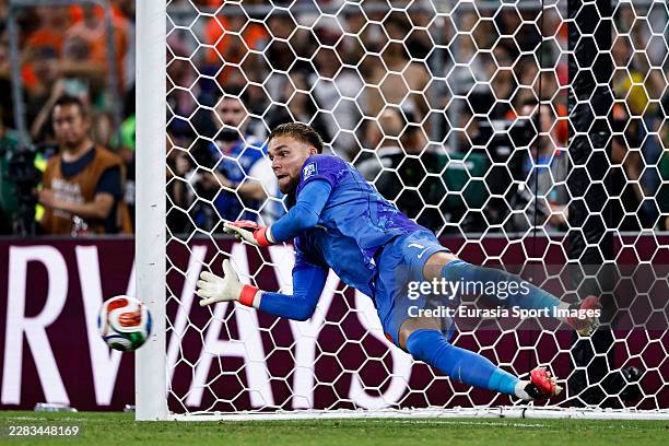 Goalkeeper Bart Verbruggen of Netherlands attempts to make a save during the penalty shootout in the FIFA World Cup 2026 Round Of 32 match between...