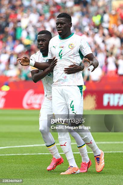 Habib Diarra of Senegal celebrates with teammate Idrissa Gana Gueye after scoring his team's first goal during the FIFA World Cup 2026 Group I match...