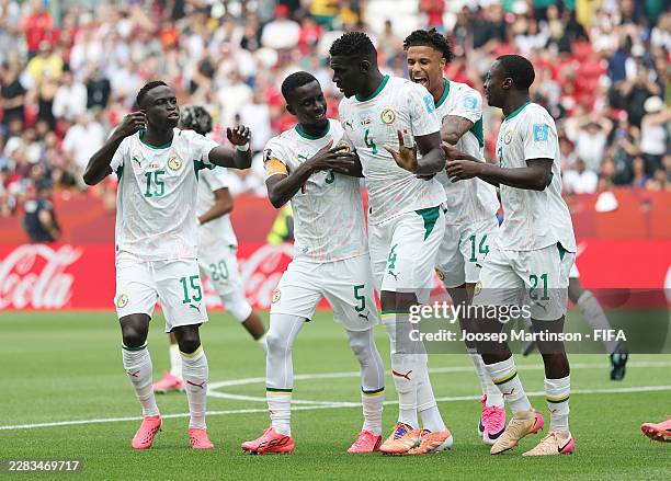 Habib Diarra of Senegal celebrates with teammates after scoring his team's first goal during the FIFA World Cup 2026 Group I match between Senegal...