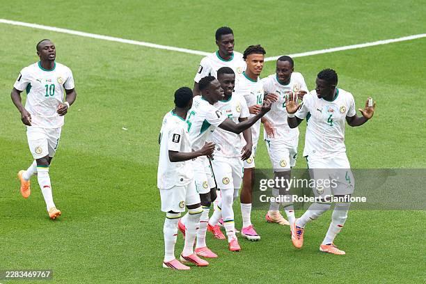 Habib Diarra of Senegal celebrates with teammates after scoring his team's first goal during the FIFA World Cup 2026 Group I match between Senegal...