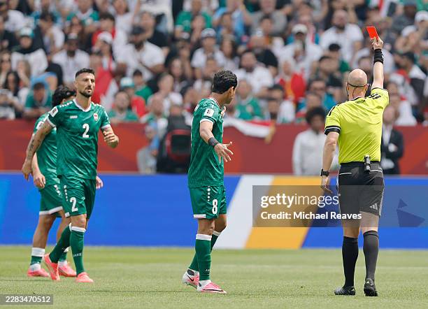 Rebin Ghareeb of Iraq receives a red card by Referee Anthony Taylor after the VAR review during the FIFA World Cup 2026 Group I match between Senegal...