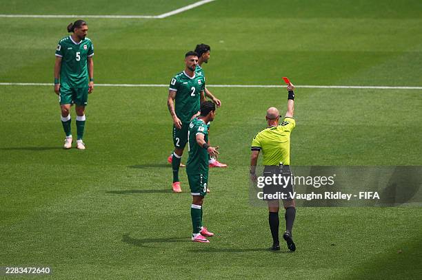 Rebin Ghareeb of Iraq receives a red card by Referee Anthony Taylor after the VAR review during the FIFA World Cup 2026 Group I match between Senegal...