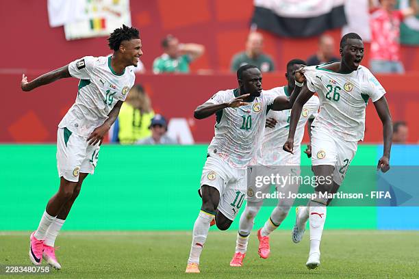 Pape Gueye of Senegal celebrates with teammates after scoring his team's third goal during the FIFA World Cup 2026 Group I match between Senegal and...