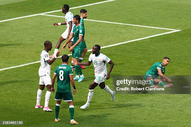 Pape Gueye of Senegal celebrates with teammates after scoring his team's fourth goal during the FIFA World Cup 2026 Group I match between Senegal and...